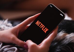 Netflix logo on phone screen