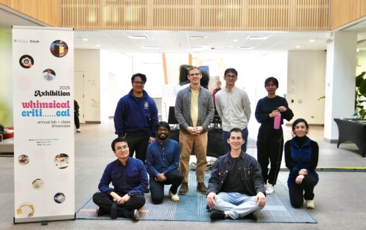 students posing for axle exhibition